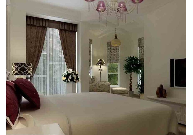 卧室一角的布艺沙发配上柔和的灯光效果很温馨。